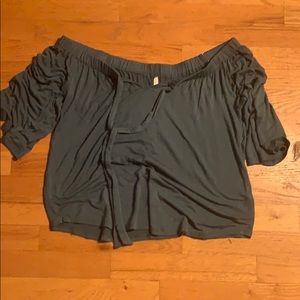 Teal off the shoulder shirt.